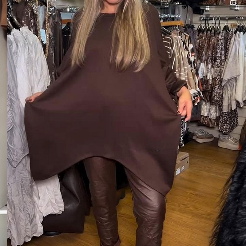 Dviejų dalių komplektas: laisva, netaisyklingo kirpimo palaidinė ir vienspalvės kelnės